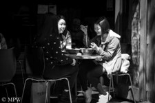 Asian ladies eating noodles for lunch